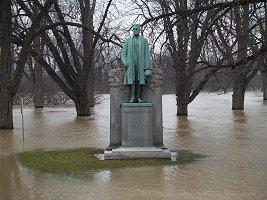 The David Foster Statue under flood water