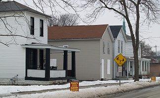 Four properties along Ewing Street are up for sale by their Indianapolis owner