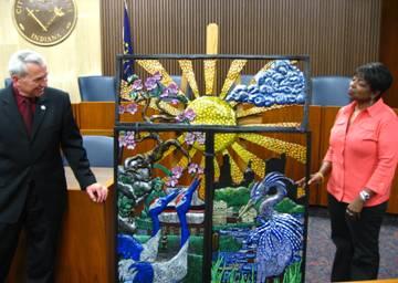 Mayor Henry with the sculpture, Okurimono.  Photo courtesy of the City of Fort Wayne.